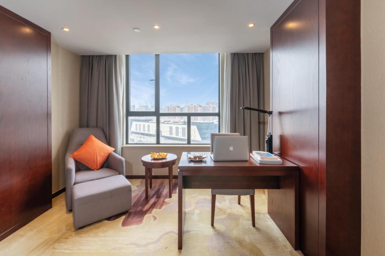 Huzhou Wealth Hotel Exterior foto