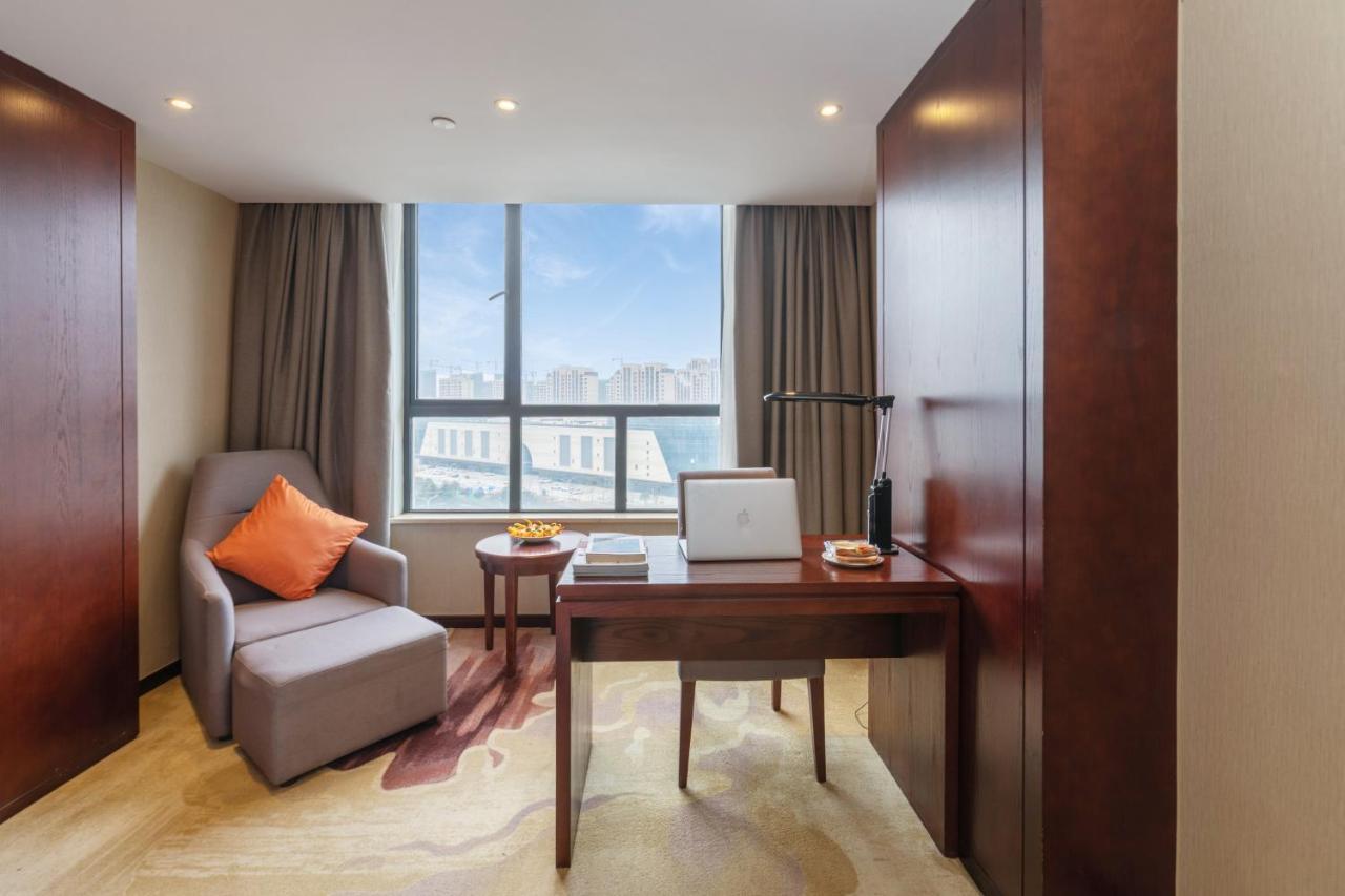 Huzhou Wealth Hotel Exterior foto